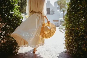 Anonymous tourist woman vacationing alone